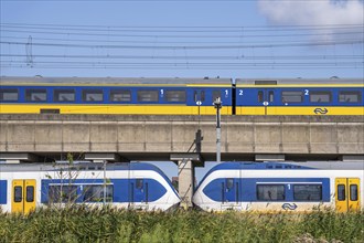 Trains of the Dutch railway, NS, Nederlandse Spoorwegen N.V., on a double-decker track, below local