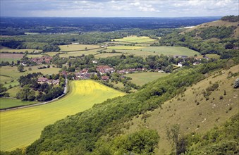 Nucleated spring line village of Poynings set in the clay farmland of the Weald, West Sussex,