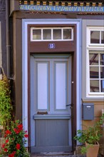 Colourful door, half-timbered, Hannoversch Münden, Hann. Münden, Lower Saxony, Germany, Europe