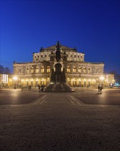 Semperoper am Theaterplatz with King Johann monument in the evening, Dresden, Saxony, Germany,