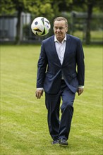 Boris Pistorius (SPD), Federal Minister of Defence, with a football. Taken during an interview.