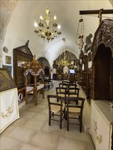 View into the right nave of the two-aisled monastery church dedicated to the Assumption of the