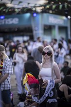 Scenes in the fan zone on Platz der Republik in front of the Reichstag building taken in Berlin, 29