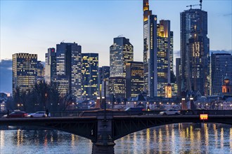 Skyline of the city centre of Frankfurt am Main, river Main, dusk, Ignatz-Bubis-Brücke, Hesse,