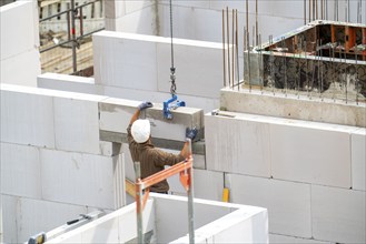 Construction site, new construction of apartment blocks, shell construction, North