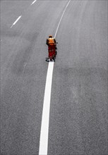 Marking work after the renewal of the road surface on the A40 motorway between the Kaiserberg