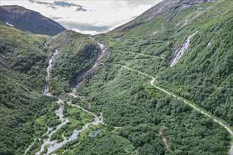 Aerial view of road Aursjovegen, a tourist route in the northern fjord region, built for