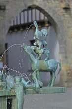 Sculptures at the fountain with Bremen Town Musicians by Karl Lemke 1979, water features, bronze