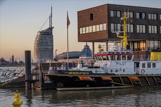 Skyline of Bremerhaven, seen over the Weser, Atlantic Sail City Hotel, Klimahaus, pilot ship in the