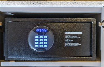 Room safe in a hotel, keypad for entering a 6-digit numerical code to lock the safe for depositing