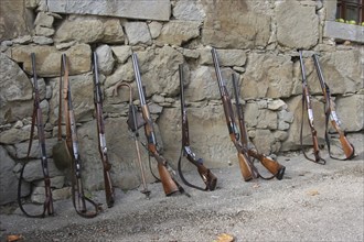 Hunting rifles, so-called shotguns, leaning against a house wall, Lower Austria, Austria, Europe