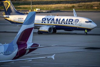 Eurowings Airbus A319 after landing on the way to Terminal 1, C-Gates, Ryanair Boeing 737 taxiing