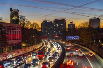 Evening traffic, partly with traffic jams, slow-moving traffic on the A40 motorway, skyline of