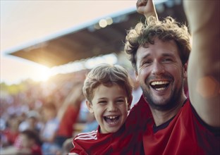 Father and son at sport game match, smiling and rooting for their favorite soccer or baseball team,