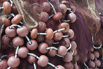 Close-up of fishing nets and orange buoys intertwined, Poros, Poros Island, Saronic Islands,