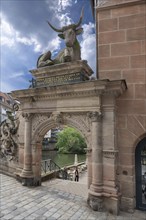 Ox figure above an archway of the former slaughterhouse, Nuremberg, Middle Franconia, Bavaria,