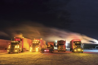 Truck, trucks, running engine, snow, winter, cold, Arctic, night shot, Eagle Plaines, Dempster