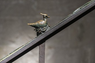 Metal figures on the banister leading to the gallery in Naumburg Cathedral, Saxony-Anhalt, Germany,