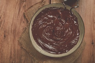 A bowl of chocolate dough, a whisk for a mixer, baking, structure and consistency, homemade, top