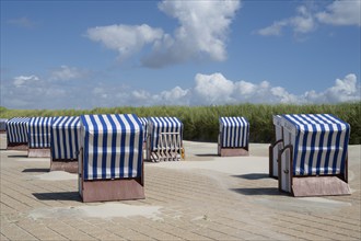 Beach chairs on the promenade, Norderney, East Frisian Island, East Frisia, Lower Saxony, Germany,