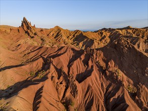 Aerial view, eroded mountain landscape, sandstone cliffs, canyon with red and orange rock