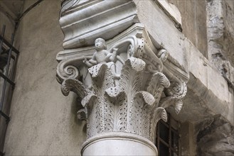 Historic column with an acanthus capital and figure, historic centre, Genoa, Italy, Europe