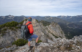 Hiker on the Schinder, Tegernsee mountains in the Mangfall mountains, Germany, Europe