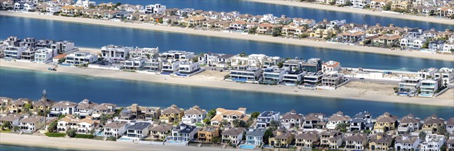 Artificial island in the shape of a palm tree The Palm Jumeirah with luxury villas property