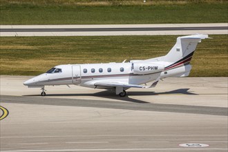 An Embraer 505 Phenom 300 aircraft of Netjets Europe with the registration CS-PHW at Split Airport,