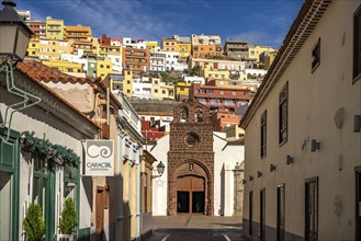 Town view with colourful houses and the Church of the Assumption of the Virgin Mary or Nuestra