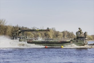 The Bundeswehr's M3 amphibious vehicle forms up in the Elbe as part of the 'Wettiner Schwert'