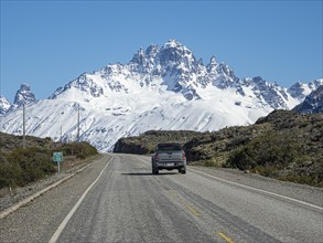 Snow-capped Mt. Cerro Castillo, pickup on rural road to Puerto Ingeniero Ibanez, east of Villa