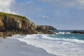 Waves breaking on the rocky coast near Plouarzel on the Atlantic coast, Département Finistère,