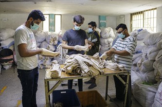 Employees of Inter Market Knit Private Limited producing socks. Lahore, 22.08.2024. Photographed on