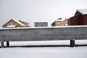 Supply lines, routed above ground on stilts due to permafrost, Kongsfjorden, Ny-Ålesund research