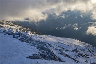 Glacier ice with crevasses in the evening light, Glacier du Tour at sunset, High alpine mountain