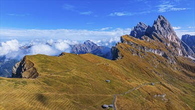 The Sas Rigais and Furchetta peaks of the Odle Group, drone shot, Val Gardena, Dolomites,