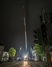 Transport of a 68 metre long, 22 tonne blade of a wind turbine, here in Breckerfeld, with a