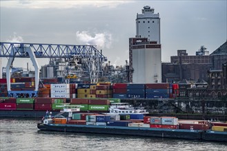 Container cargo ship on the Rhine near Krefeld, Rhine harbour Krefeld, container terminal, Cargill