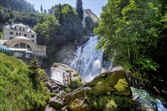 Waterfall of the Gasteiner Ache in the centre with historic power station, Bad Gastein, Gastein