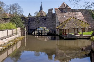 Le Bruch, old town wall with weir and historic wash house on the Lauter, Wissembourg, Northern