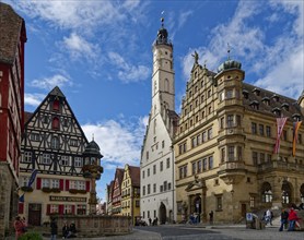 Town hall and half-timbered houses on the market square in the old town centre of Rothenburg ob der