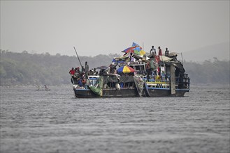 Overloaded ferry on the Congo River, near Tshumbiri, Mai-Ndombe Province, Democratic Republic of