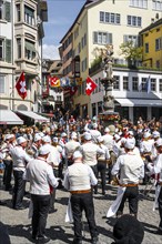 Historically costumed guildsmen in Zurich's Old Town, stand concert at Münzplatz, Zunft zum Weggen,