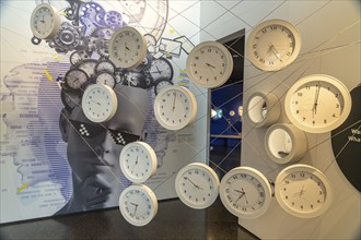 Exhibition with clocks in the interior of the Museum for Future Issues Futurium in Berlin, Germany,