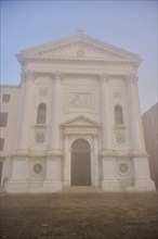 Church 'Chiesa santa Maria della Pieta' before sunrise in Venice on a foggy morning in winter,