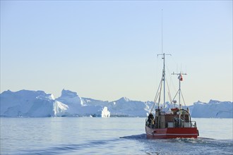 Excursion boat on fjord Ilulissat, Icefjord, Disko Bay, Qaasuitsup, Greenland, Polar Regions,