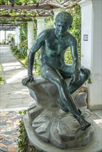 Roman statue under pergola at Villa San Michele, the life's work at Capri of the Swedish physician