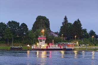 The Pillau canal ferry late in the evening at the Sehestedt-Süd ferry terminal on the Kiel Canal.