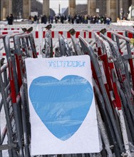 Demonstration, posters and barriers at the Brandenburg Gate, Berlin, Germany, Europe